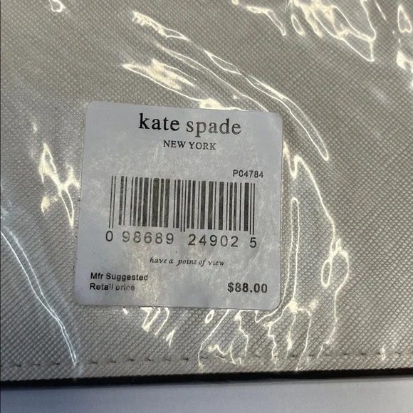 NWT Kate Spade cream saffiano wristlet with gold logo.  8x5” - Picture 6 of 7
